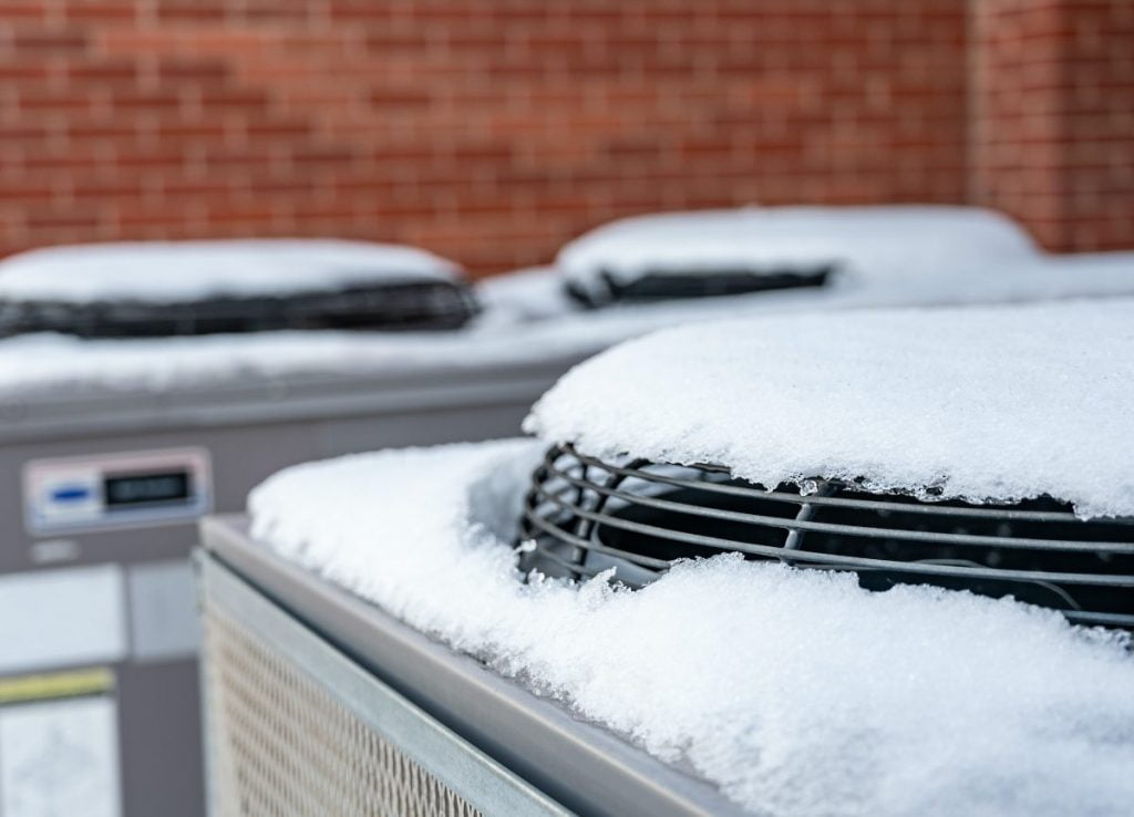 Air Conditioner covered in snow